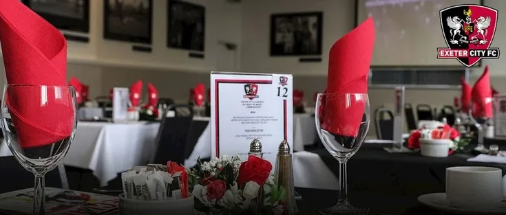 Khu vực dịch vụ khách sạn Supporters Trust Suite bên trong St. James Park Exeter, mang lại trải nghiệm VIP cho người hâm mộ.